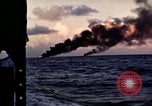 Image of ships burn Saipan Northern Mariana Islands, 1944, second 31 stock footage video 65675035299