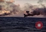 Image of ships burn Saipan Northern Mariana Islands, 1944, second 33 stock footage video 65675035299