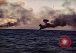 Image of ships burn Saipan Northern Mariana Islands, 1944, second 34 stock footage video 65675035299