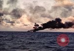 Image of ships burn Saipan Northern Mariana Islands, 1944, second 35 stock footage video 65675035299