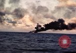 Image of ships burn Saipan Northern Mariana Islands, 1944, second 36 stock footage video 65675035299