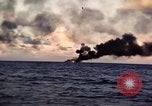 Image of ships burn Saipan Northern Mariana Islands, 1944, second 37 stock footage video 65675035299