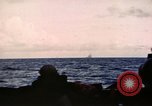 Image of ships burn Saipan Northern Mariana Islands, 1944, second 41 stock footage video 65675035299