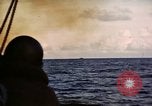 Image of ships burn Saipan Northern Mariana Islands, 1944, second 43 stock footage video 65675035299