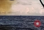 Image of ships burn Saipan Northern Mariana Islands, 1944, second 49 stock footage video 65675035299