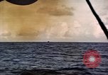 Image of ships burn Saipan Northern Mariana Islands, 1944, second 50 stock footage video 65675035299