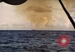 Image of ships burn Saipan Northern Mariana Islands, 1944, second 51 stock footage video 65675035299