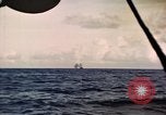 Image of ships burn Saipan Northern Mariana Islands, 1944, second 53 stock footage video 65675035299