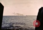 Image of ships burn Saipan Northern Mariana Islands, 1944, second 60 stock footage video 65675035299