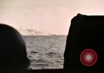 Image of ships burn Saipan Northern Mariana Islands, 1944, second 62 stock footage video 65675035299