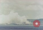 Image of explosion Saipan Northern Mariana Islands, 1944, second 4 stock footage video 65675035305