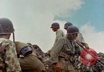 Standbild US Marines Saipan Nördliche Marianen, 1944, aus Sekunde 14 historischem Filmmaterial Videoclip 65675035306