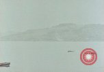 Standbild Bombardierung auf Saipan Saipan Nördliche Marianen, 1944, aus Sekunde 17 historischem Filmmaterial Videoclip 65675035315