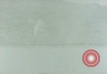 Standbild Bombardierung auf Saipan Saipan Nördliche Marianen, 1944, aus Sekunde 25 historischem Filmmaterial Videoclip 65675035315