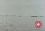 Standbild Bombardierung auf Saipan Saipan Nördliche Marianen, 1944, aus Sekunde 46 historischem Filmmaterial Videoclip 65675035315