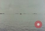Standbild Bombardierung auf Saipan Saipan Nördliche Marianen, 1944, aus Sekunde 50 historischem Filmmaterial Videoclip 65675035315