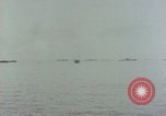 Standbild Bombardierung auf Saipan Saipan Nördliche Marianen, 1944, aus Sekunde 52 historischem Filmmaterial Videoclip 65675035315