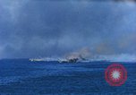 Standbild Bombardierung auf Schiffen Saipan Nördliche Marianen, 1944, aus Sekunde 4 historischem Filmmaterial Videoclip 65675035320