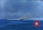 Standbild Bombardierung auf Schiffen Saipan Nördliche Marianen, 1944, aus Sekunde 6 historischem Filmmaterial Videoclip 65675035320