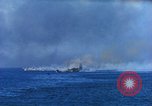 Standbild Bombardierung auf Schiffen Saipan Nördliche Marianen, 1944, aus Sekunde 7 historischem Filmmaterial Videoclip 65675035320
