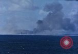 Standbild Explosionen Saipan Nördliche Marianen, 1944, aus Sekunde 27 historischem Filmmaterial Videoclip 65675035322