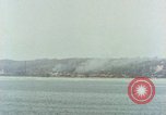 Image of US Navy warships shell Guam during World War II Guam, 1944, second 1 stock footage video 65675035328