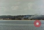 Image of US Navy warships shell Guam during World War II Guam, 1944, second 15 stock footage video 65675035328