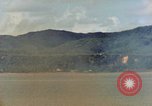 Image of US Navy warships shell Guam during World War II Guam, 1944, second 56 stock footage video 65675035328