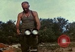 Image of Marine photographer Saipan Northern Mariana Islands, 1944, second 21 stock footage video 65675035336