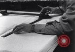 Image of navigator plotting a course Pacific Ocean, 1942, second 1 stock footage video 65675035344