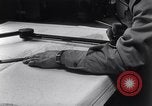 Image of navigator plotting a course Pacific Ocean, 1942, second 3 stock footage video 65675035344