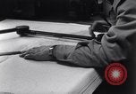 Image of navigator plotting a course Pacific Ocean, 1942, second 5 stock footage video 65675035344