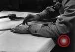 Image of navigator plotting a course Pacific Ocean, 1942, second 6 stock footage video 65675035344