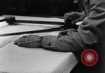 Image of navigator plotting a course Pacific Ocean, 1942, second 9 stock footage video 65675035344