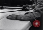 Image of navigator plotting a course Pacific Ocean, 1942, second 10 stock footage video 65675035344