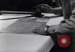 Image of navigator plotting a course Pacific Ocean, 1942, second 13 stock footage video 65675035344