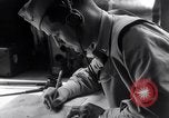 Image of navigator plotting a course Pacific Ocean, 1942, second 20 stock footage video 65675035344