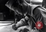Image of navigator plotting a course Pacific Ocean, 1942, second 22 stock footage video 65675035344