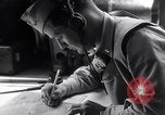 Image of navigator plotting a course Pacific Ocean, 1942, second 24 stock footage video 65675035344