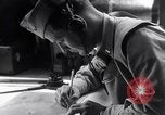 Image of navigator plotting a course Pacific Ocean, 1942, second 25 stock footage video 65675035344