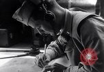 Image of navigator plotting a course Pacific Ocean, 1942, second 26 stock footage video 65675035344