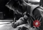 Image of navigator plotting a course Pacific Ocean, 1942, second 27 stock footage video 65675035344