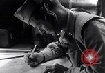 Image of navigator plotting a course Pacific Ocean, 1942, second 28 stock footage video 65675035344