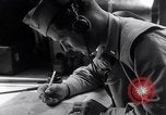 Image of navigator plotting a course Pacific Ocean, 1942, second 29 stock footage video 65675035344
