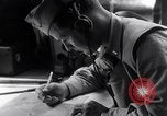 Image of navigator plotting a course Pacific Ocean, 1942, second 30 stock footage video 65675035344