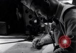Image of navigator plotting a course Pacific Ocean, 1942, second 35 stock footage video 65675035344