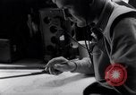 Image of navigator plotting a course Pacific Ocean, 1942, second 36 stock footage video 65675035344