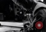 Image of navigator plotting a course Pacific Ocean, 1942, second 38 stock footage video 65675035344