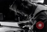 Image of navigator plotting a course Pacific Ocean, 1942, second 40 stock footage video 65675035344