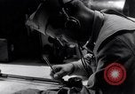 Image of navigator plotting a course Pacific Ocean, 1942, second 41 stock footage video 65675035344